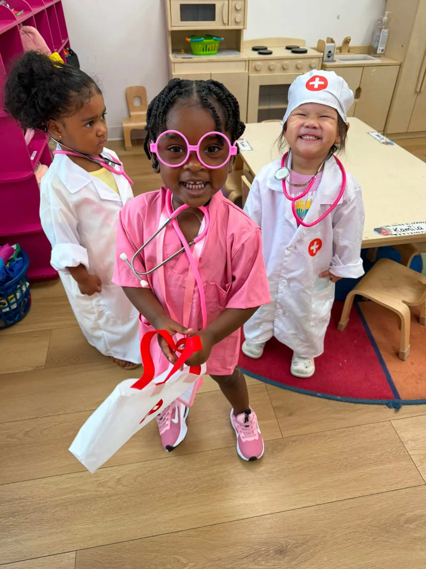 Toddler enjoying an age-appropriate school activity