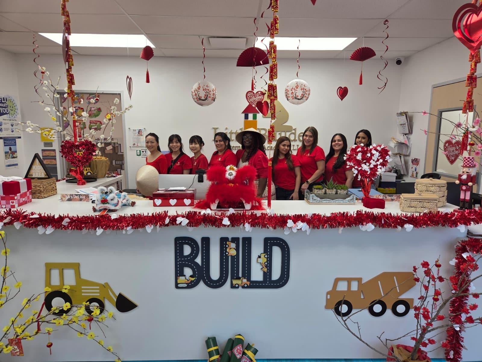 Little Builders International Academy staff celebrating together